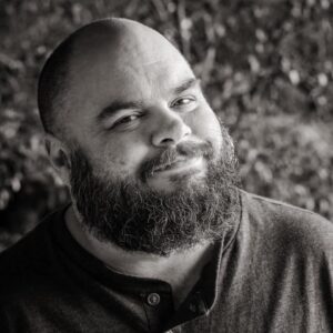 Man with beard in black & white