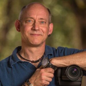 Smiling man with Camera