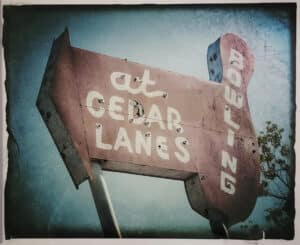 Distressed bowling sign