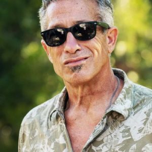 Man with sunglasses smiling